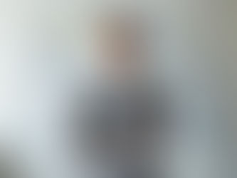 Aspiring entrepreneur stands confidently in front of a business strategy board, ready to tackle the essentials of starting a new venture.