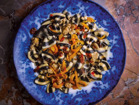 italian pasta recipes: striped farfalle with peppers and sausage