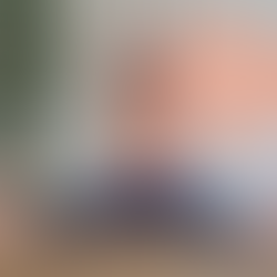 A woman in a wide legged sitting position