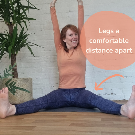 A woman in a wide legged sitting position