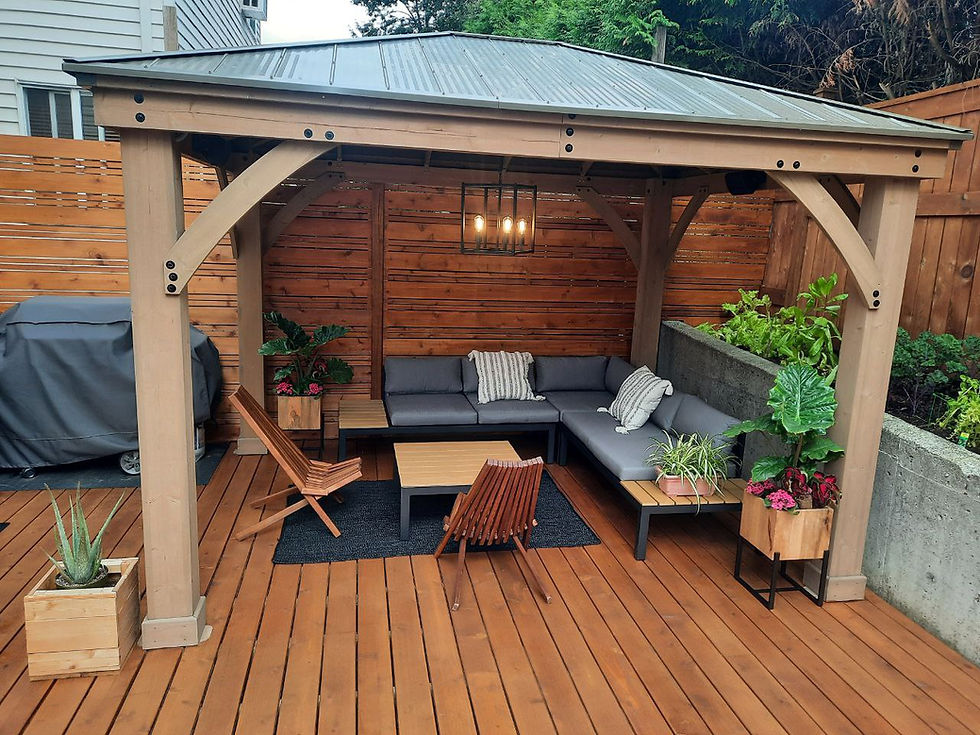 Custom cedar fence and patio design by Cascadia Construction in Langley