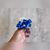 Ivory Rose Boutonniere with Royal Blue Ribbon