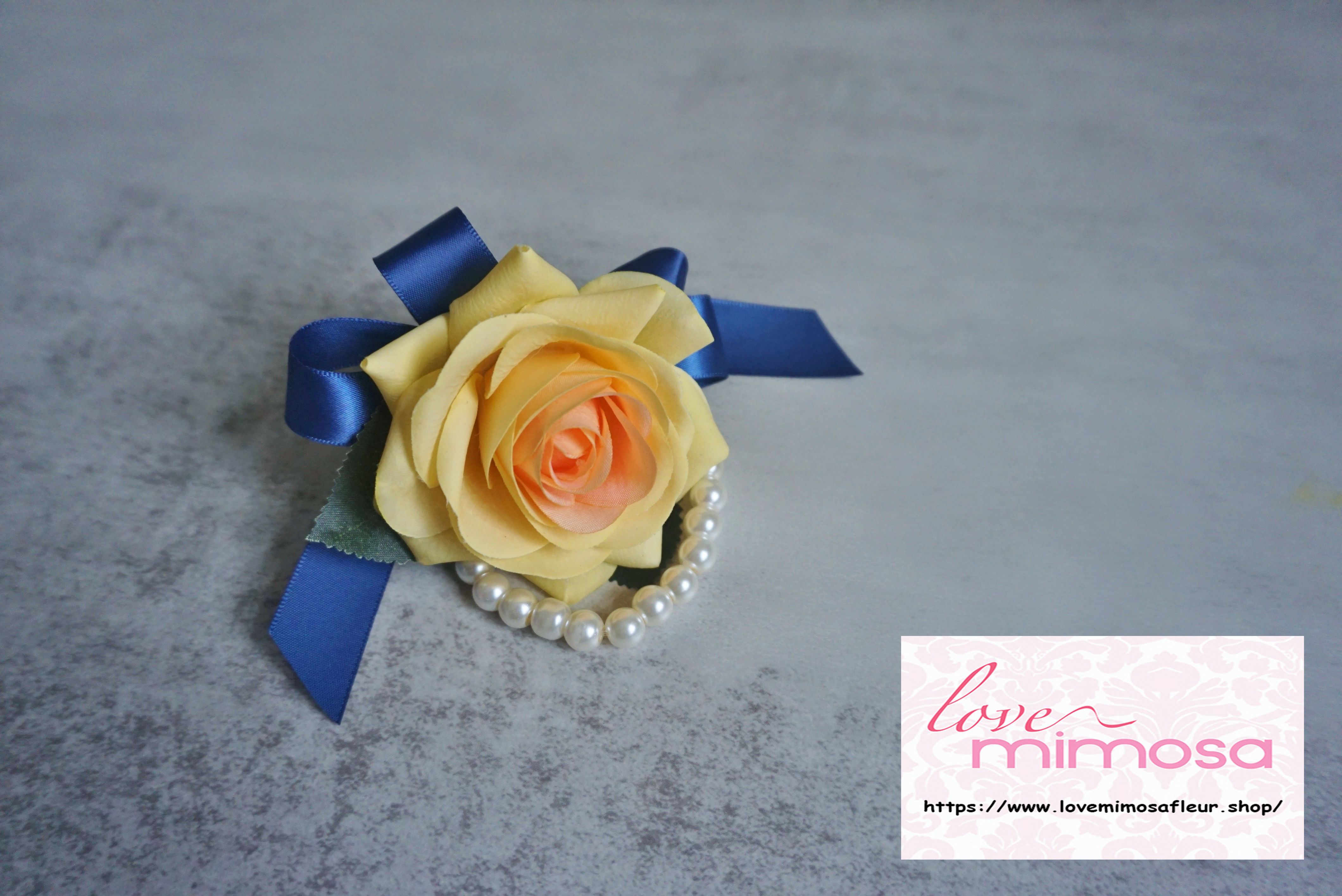 Yellow Rose Navy Ribbon Corsage