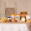 Thumbnail: Eco-friendly staff Christmas gift box with festive snacks and treats displayed on a table