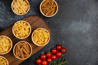 pasta-varieties-in-wooden-cups-served-with-cherry-2023-11-27-04-52-07-utc.jpg