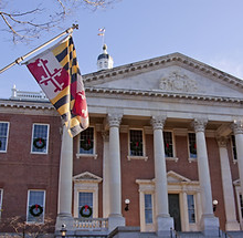 The Maryland state flag at the north entrance of the State House in Annapolis, MD. where t