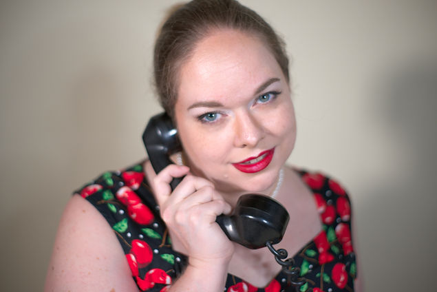 Mistress Holly on phone