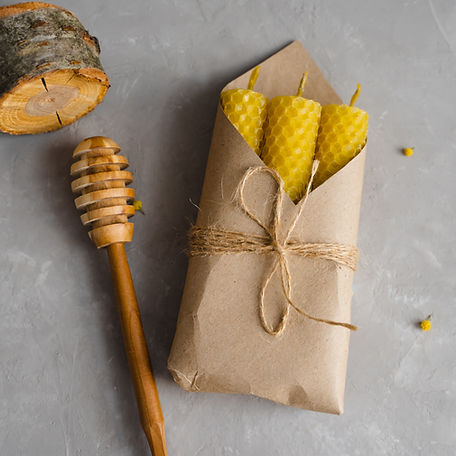 Set of handmade honey candles in a craft envelope. Magic candles. Honey candles for medita
