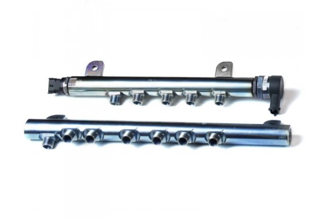 Two metallic engine rails with multiple outlets