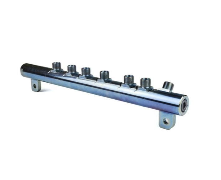 Metallic manifold with multiple ports