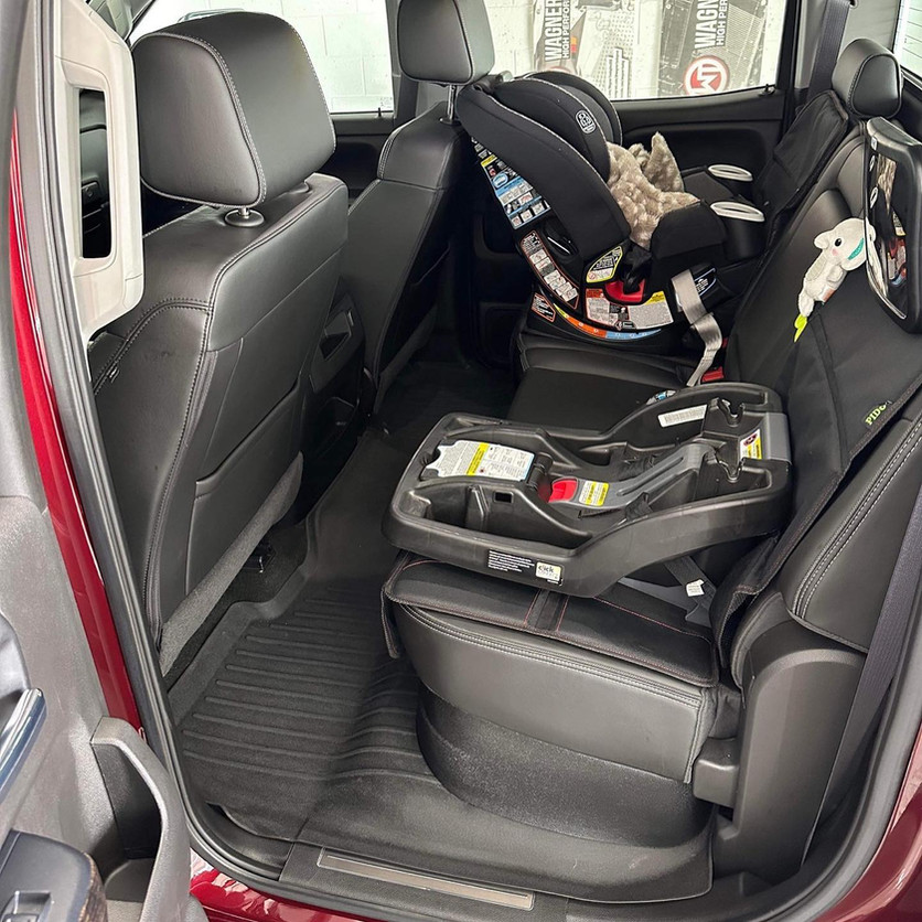 Vehicle back seats with infant car seat base and child car seat