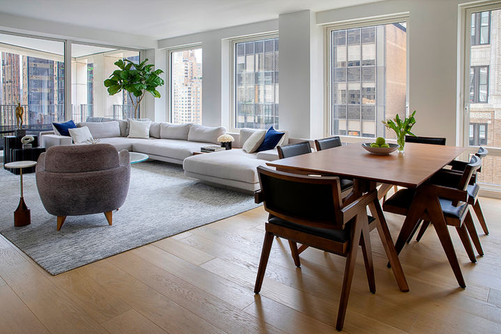 New York Apartment. Urban Living. Columbus Circle Residence. Luxury living. Residential design. Interior design. Open floor plan. High-end finishes. Custom millwork. City views. Smart home technology. Multi-functional spaces. Built-in storage solutions. Kitchen design. Bathroom design. Color palette. Textures. Materials. Furniture selection. Art and accessories. Contemporary design. Modern design. Minimalist design. Large windows. Natural light. Sustainable design. Architectural features.