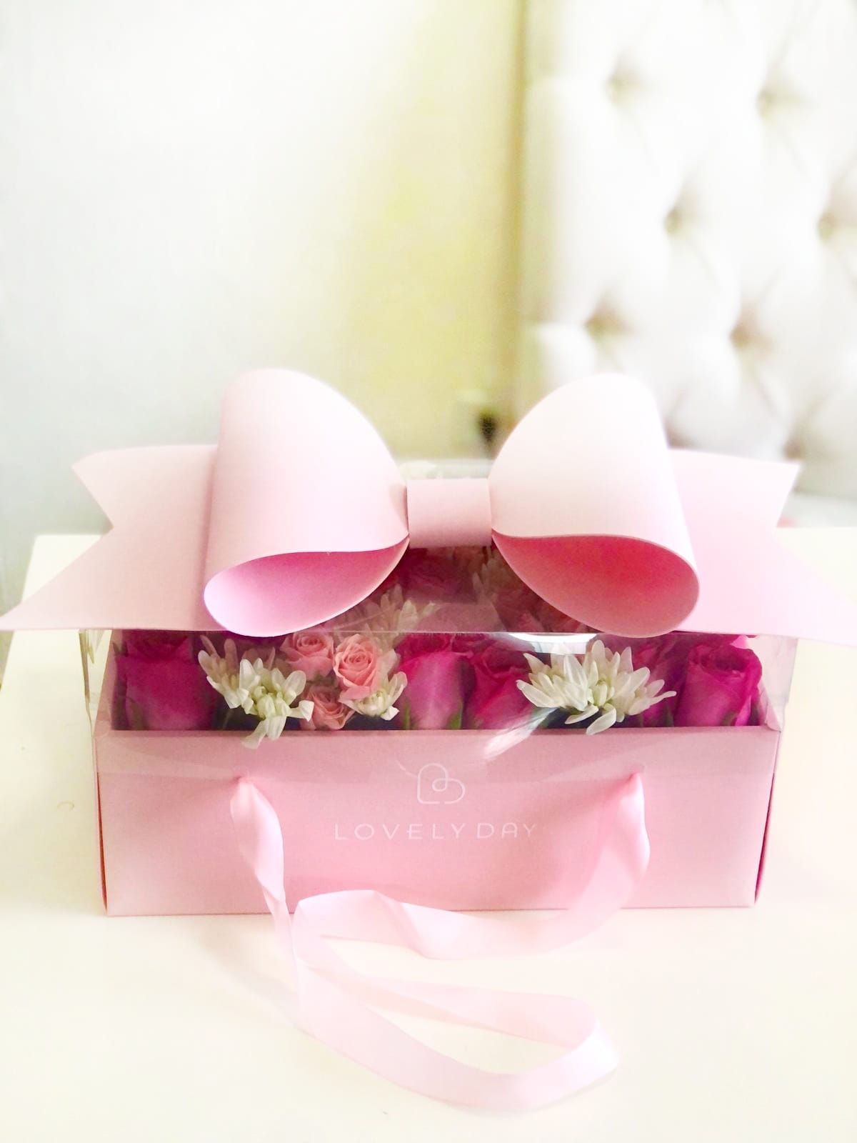 Caja con moño rosa