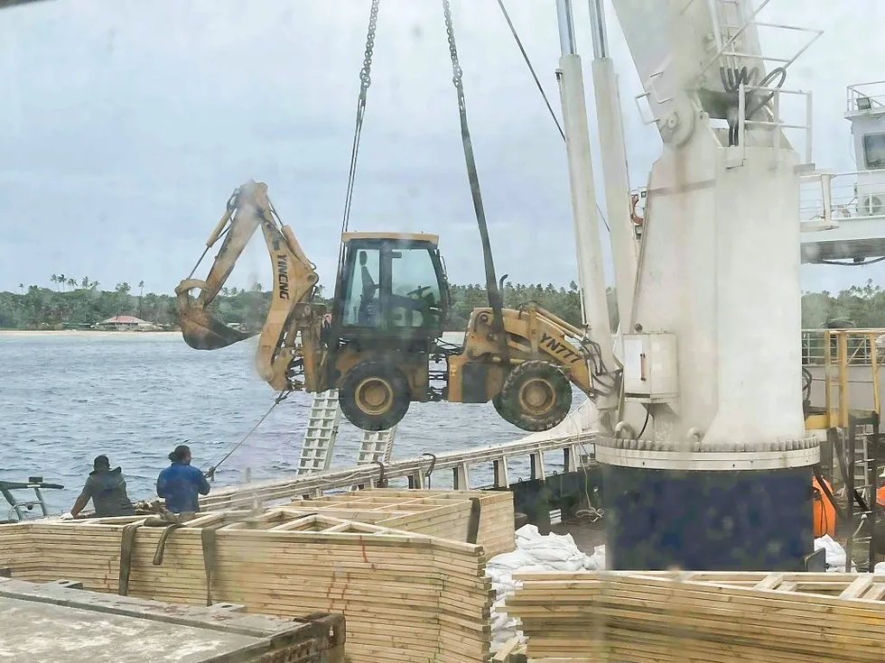 Offloading construction material and equipment in Fonoi Haapai in November 2022 to start rebuilding houses lost during the Hunga Tonga volcano tsunami in ten months earlier. Image: MOI