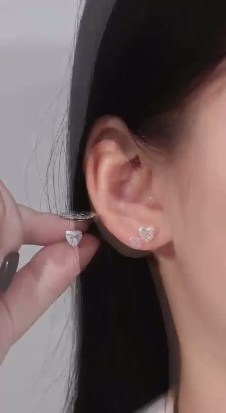 Heart lab diamond stud earrings on-ear view
