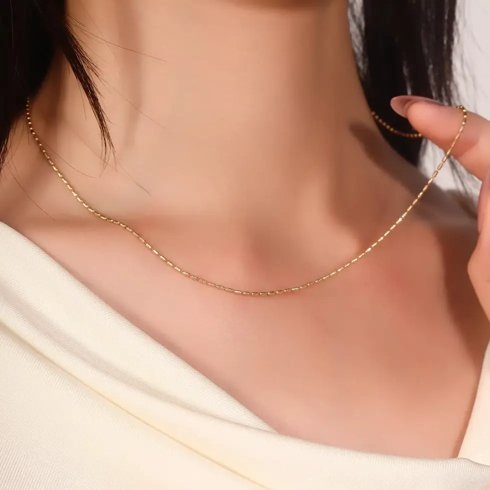 plain gold beaded chain necklace close up