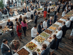 Large-scale corporate catering event with buffet stations and professional food service for business conference attendees in New Jersey.