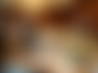 Luxurious indoor wedding reception setup with full-service catering team, featuring elegant white floral centrepieces, gold chargers, and professional waitstaff.