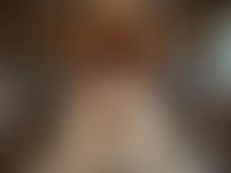 Elegant banquet table setup by professional caterers in a luxury event hall, featuring floral centerpieces, fine dining tableware, and staff preparing for a corporate or wedding catering event.