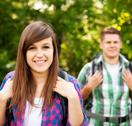 young-couple-walking-through-forest.jpg