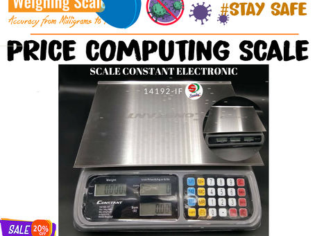 price computing scale with money change function at supplier shop Kampala