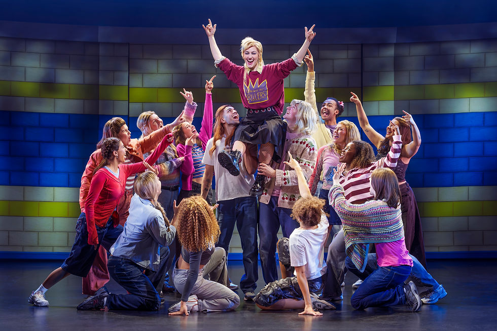 Georgie Buckland (Janis Sarkisian) and Company. Photo by Paul Coltas