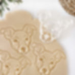 Thumbnail: Feist Dog Cookie Cutter shown with dough ready for baking