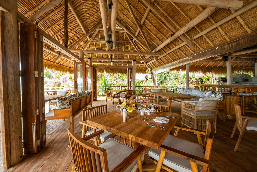 Wooden dining area with open roof design on Nikoi Private Island