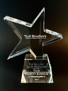 Top Selling Sales Manager of the Year presented to national award-winning real estate broker Mahtty Najari Kowalik by Toll Brokers