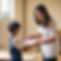 a teacher giving a child a certificate.jpg