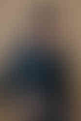 Modern portrait of a woman with confident expression photographed in a Tustin studio