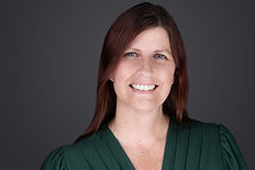 Studio headshot of a creative entrepreneur with genuine smile and Peter Hurley catchlight—perfect for personal branding and media profiles.
