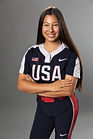 Studio portrait of a female athlete in sportswear with confident stance—ideal for personal branding, sponsorship profiles, and sports media coverage.