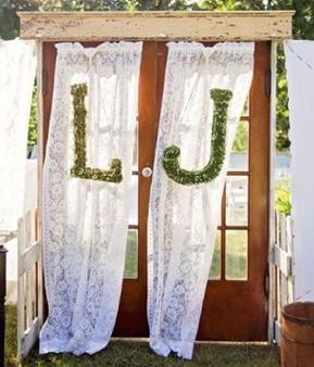 Double French doors with glass panes, and decorative knobs. Open and close.