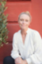 Jannie sitting and looking at the camera