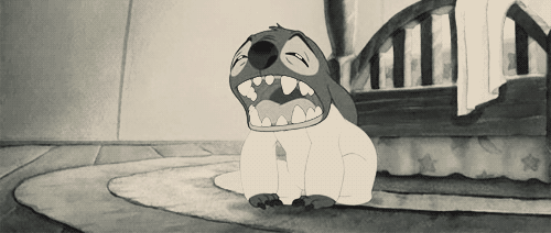 Gif of Stitch in a nightgown and collapsing in exhaustion