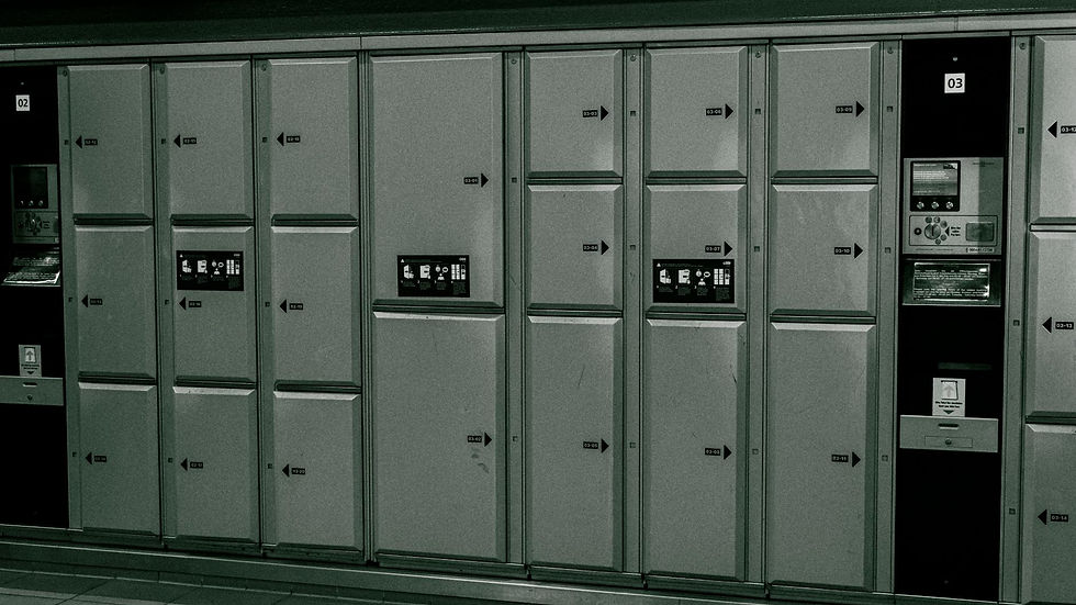 Secure metal lockers with electronic payment system at a station.