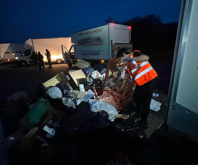 A VaiVan porter removing rubbish for a rubbish removal clearance service