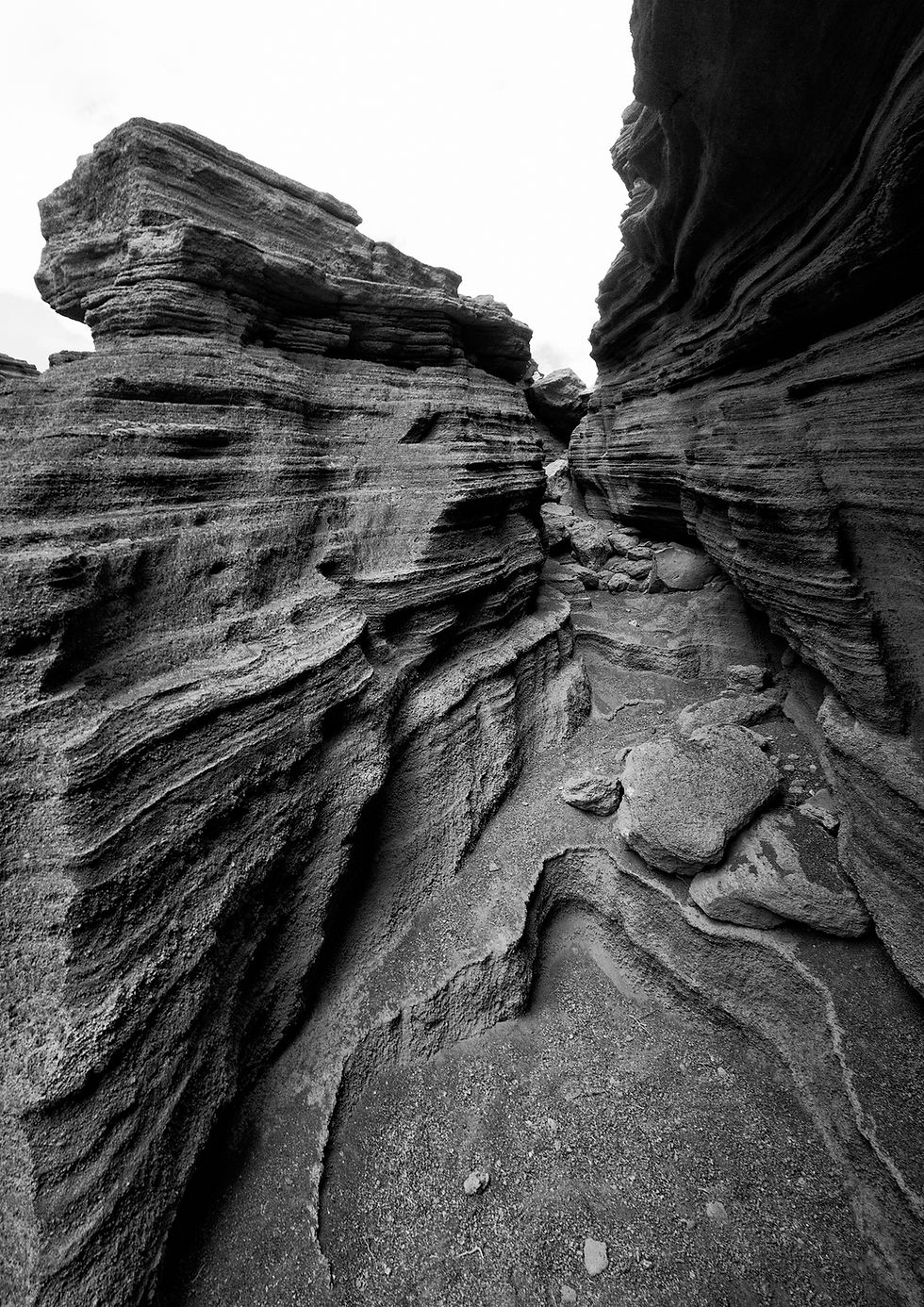Fine art abstract photography of layered volcanic rock textures inside Las Grietas fissures in Lanzarote