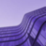 modern-curved-glass-building-exterior-2024-07-05-01-44-32-utc.jpg