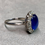 Thumbnail: Vintage 1940’s Platinum Royal Blue Star Sapphire Carré Diamond Ring 8.30ctw