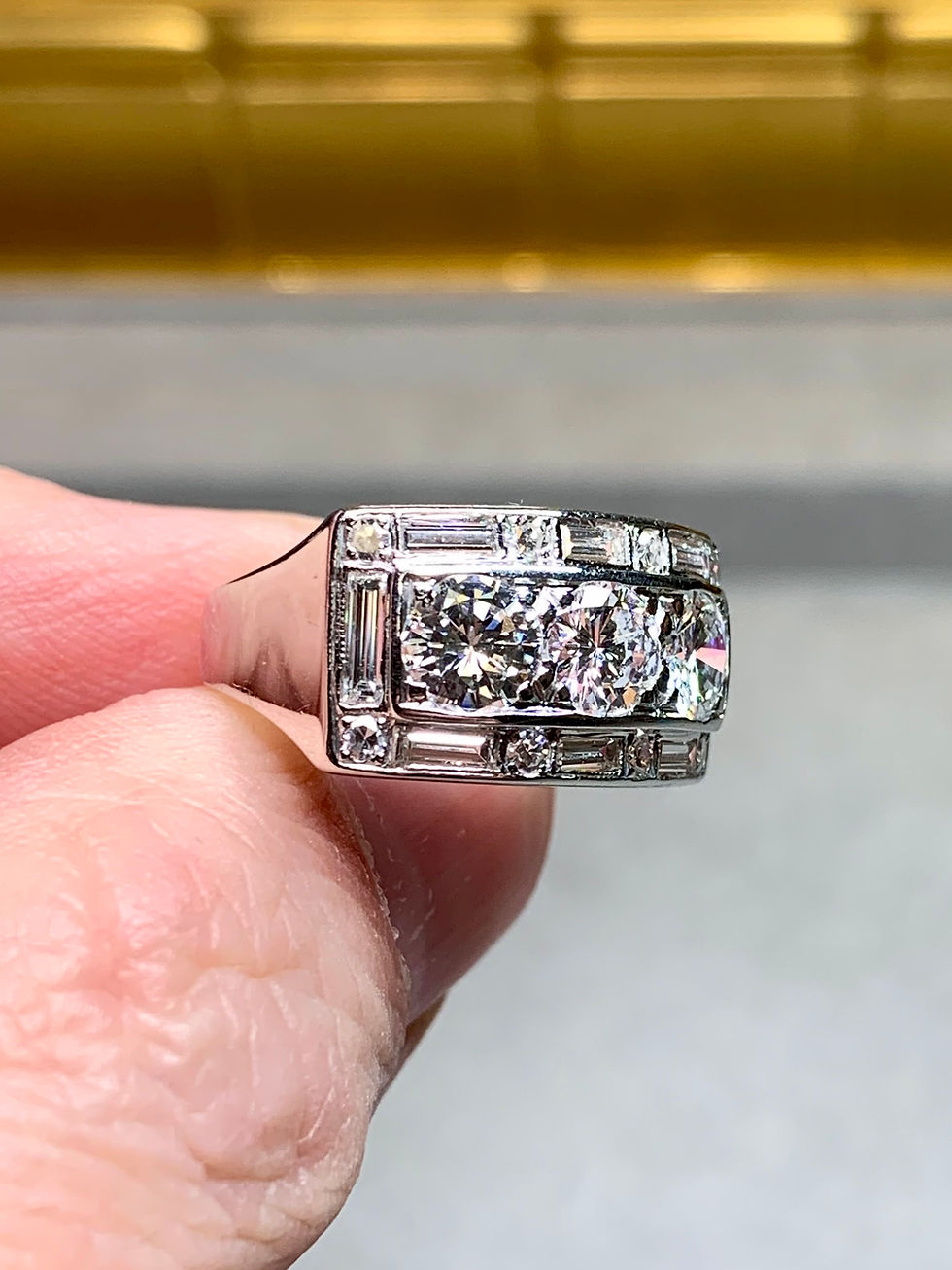 Thumbnail: Vintage 1940’s Platinum 3 Stone Baguette Round Diamond Cigar Band Ring