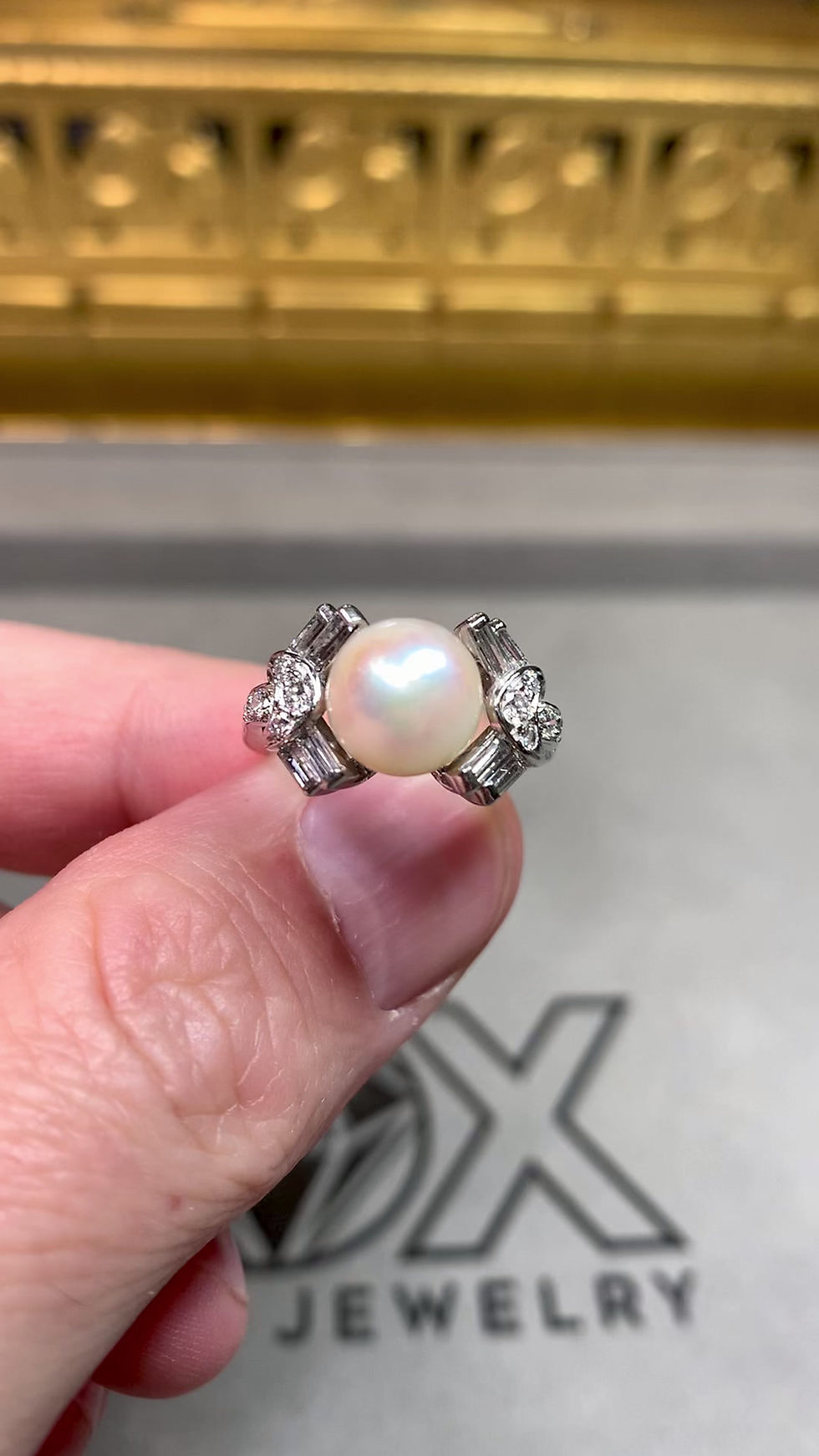 Thumbnail: Vintage 1940’s Platinum Geometric Pearl Baguette Round Diamond Cocktail Ring