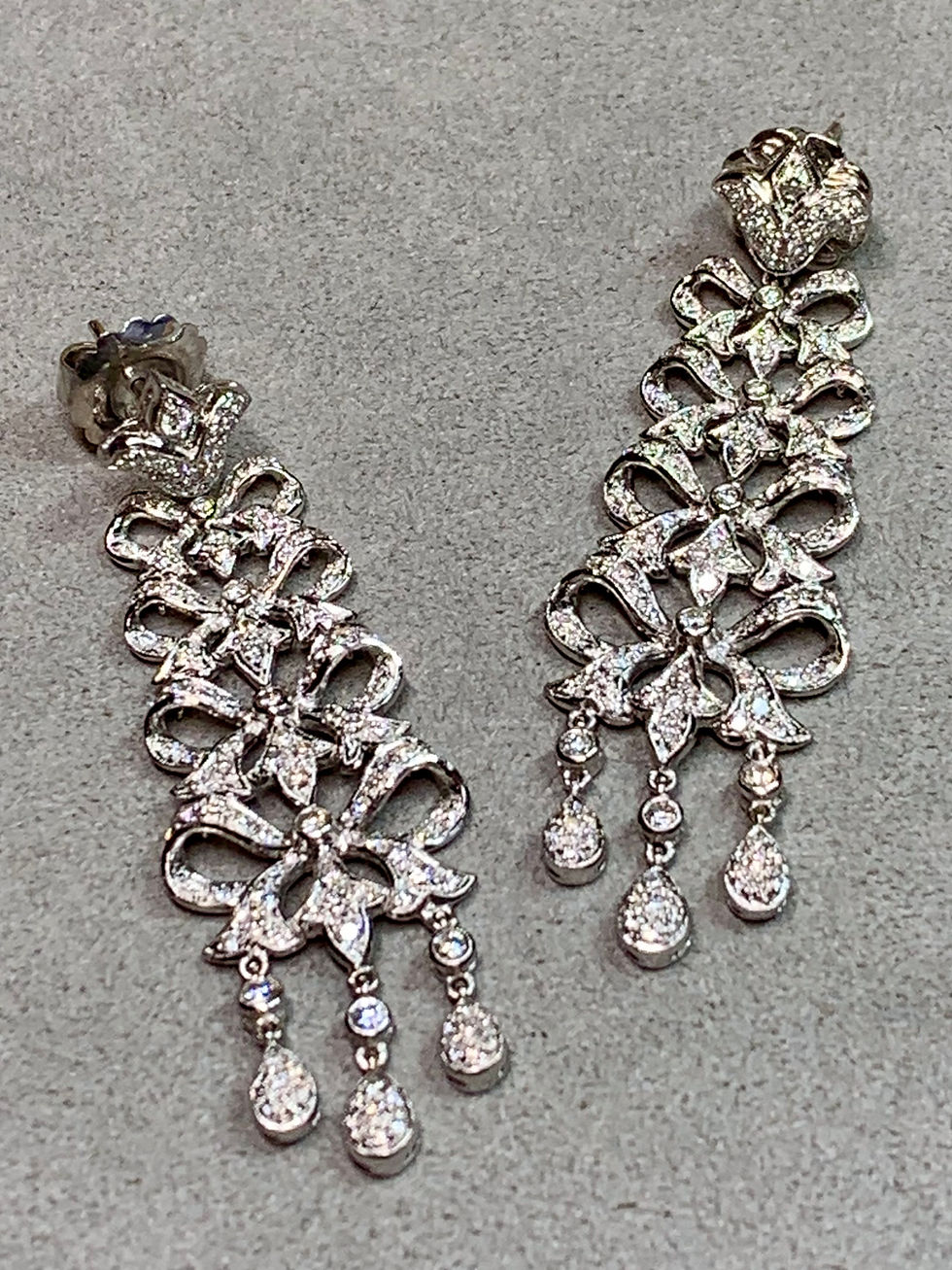 Thumbnail: Estate 18K White Gold Articulating Diamond Bow Long Drop Dangle Earrings