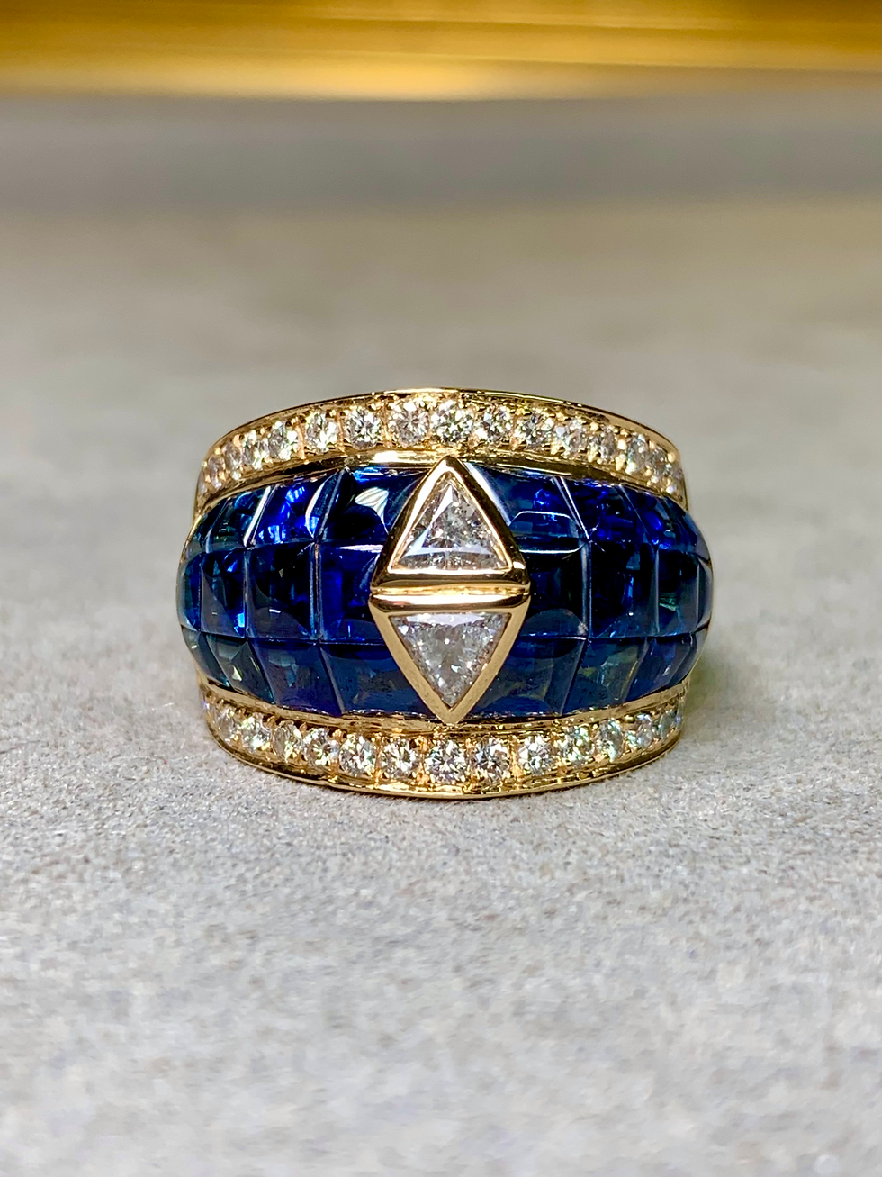 Thumbnail: 18K Invisible Set Buff Top Sapphire Trilliant Round Diamond Wide Cocktail Ring