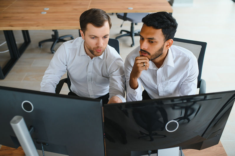 two-successful-trader-in-formalwear-pointing-at-di-2023-11-29-23-56-01-utc.jpg