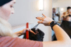 Tessa Matsis Smith cutting short hair on a female client in the salon