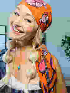 Bubble braids worn with head scarf by Tessa Matsis Smith