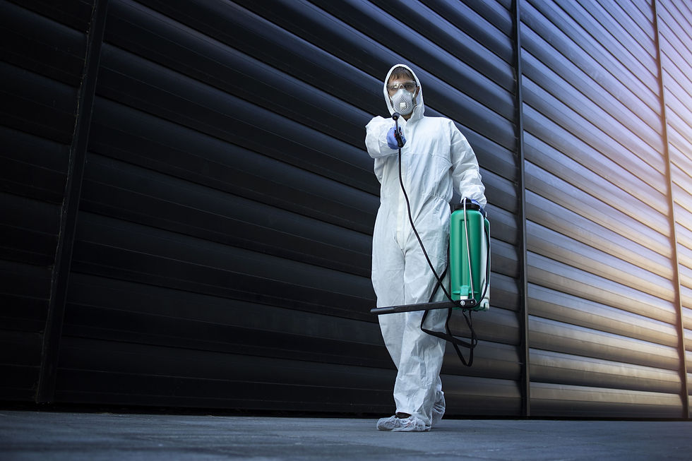 person-in-white-chemical-protection-suit-doing-disinfection-and-pest-control-and-spraying-