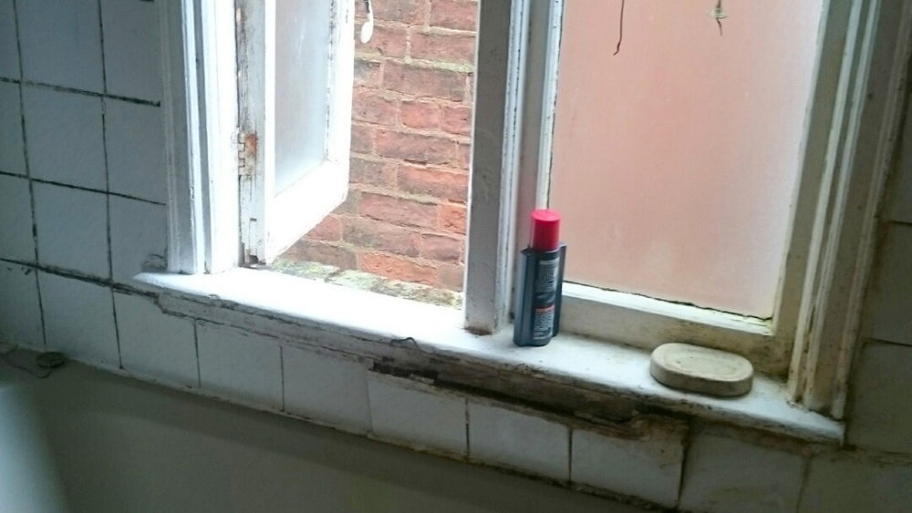 water damaged open casement winodw